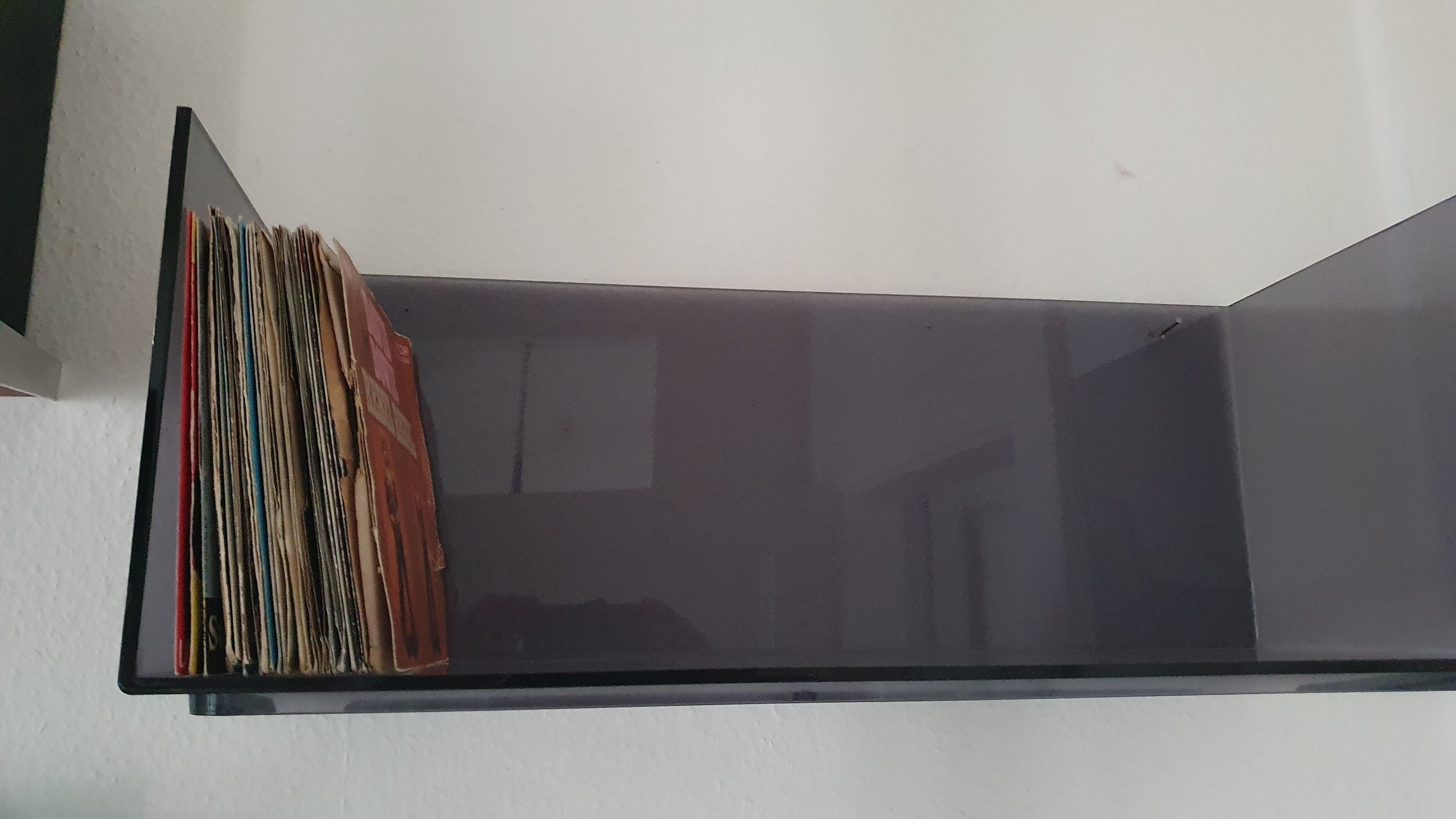 Plexiglas wall shelf