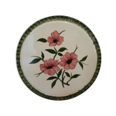 Plat en terre cuite à décor floral