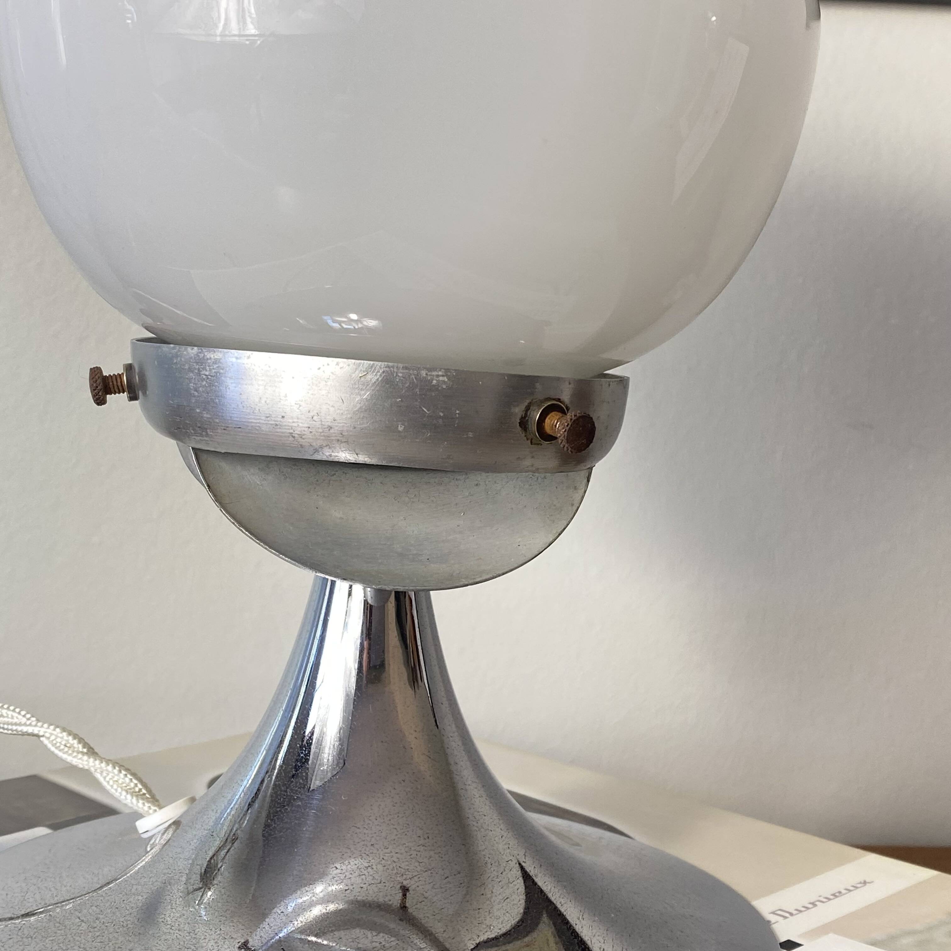 Vintage globe lamp in white opaline glass and chrome metal.