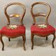 Pair of Louis Philippe walnut chairs, petit point tapestry