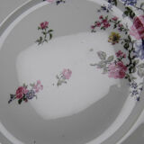 4 flat plates by Bernardaud, Limoges porcelain, floral decoration from the 1920s to 1950s.