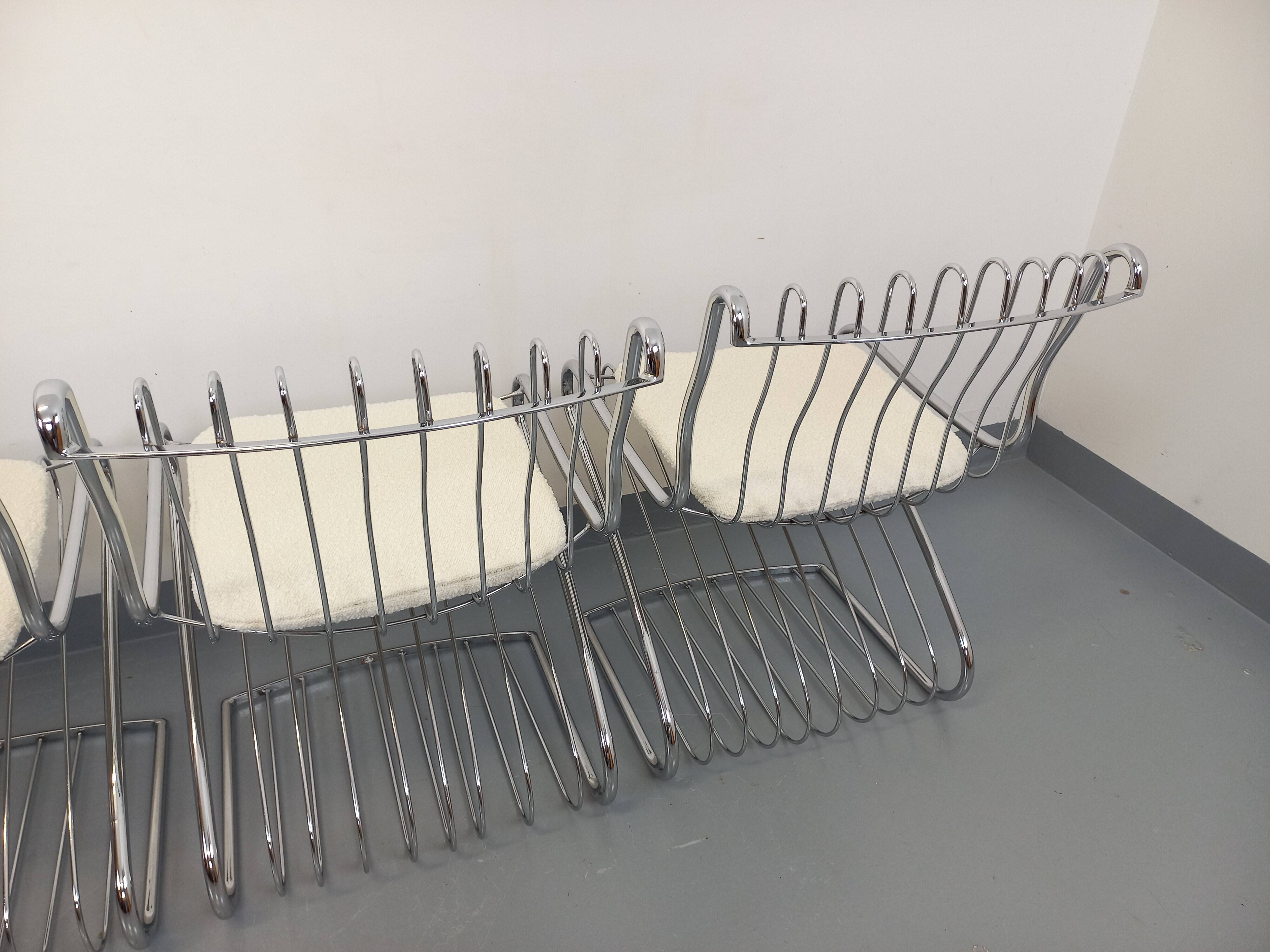 Set of 4 vintage Italian chairs by Gastone Rinaldi in chrome metal.