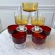 Set of 8 champagne glasses in amber colored glass and garnet 70s