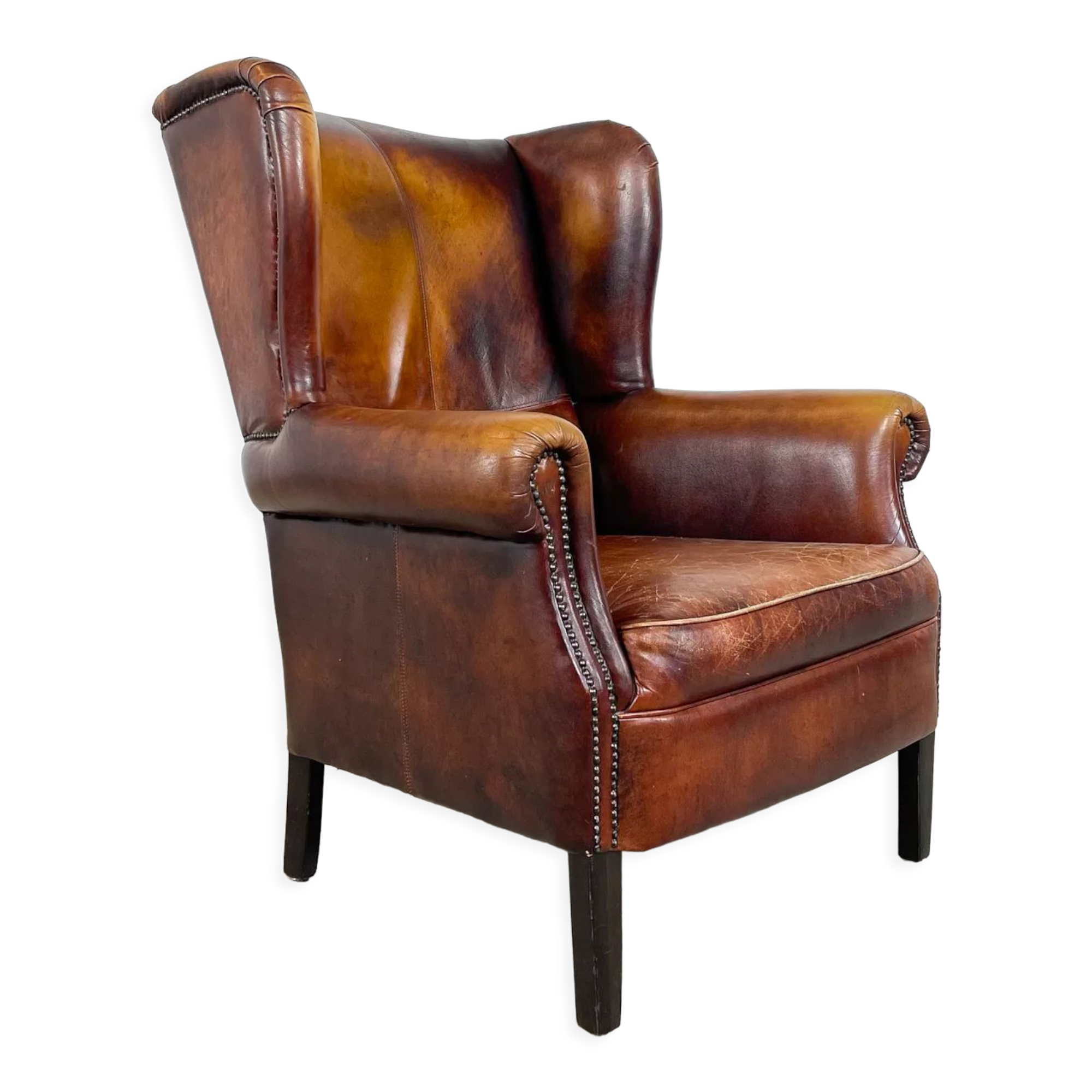 Vintage sheep leather wingback armchair Goor