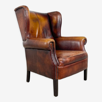 Vintage sheep leather wingback armchair Goor