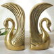 Serre livres cygnes vintage laiton
