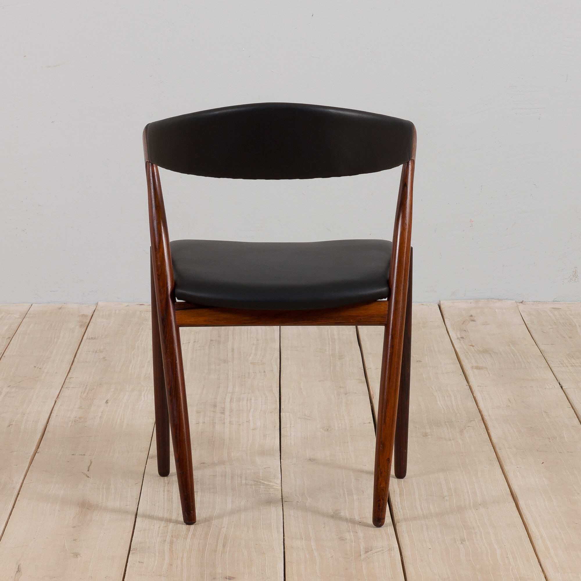 Kai Kristiansen rosewood desk chair 31 in reupholstered in soft black leather, Denmark, 60s