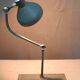 Articulated metal industrial lamp