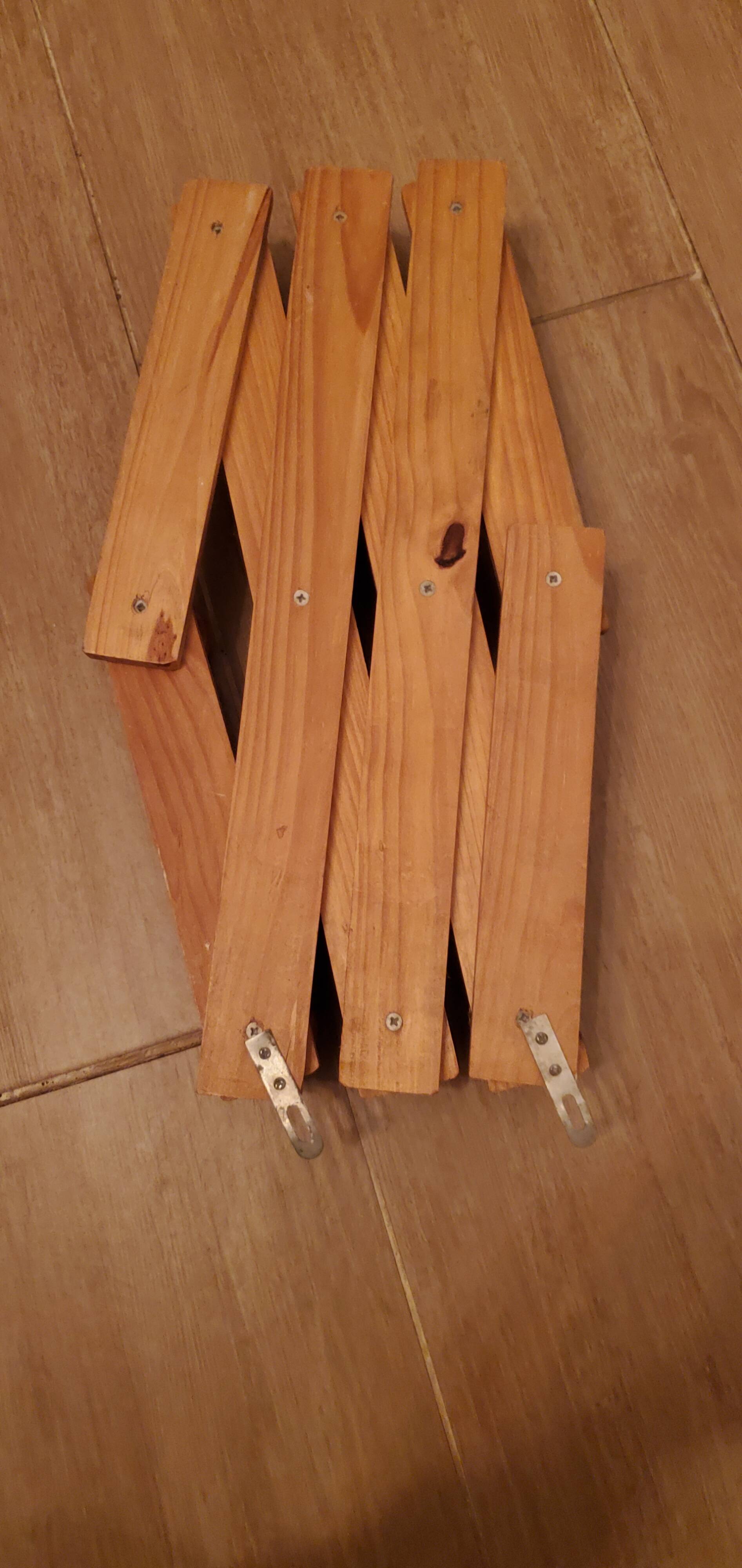 Accordion wall coat rack