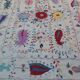 White suzani kilim rug with hand embroidered multi-colored patterns