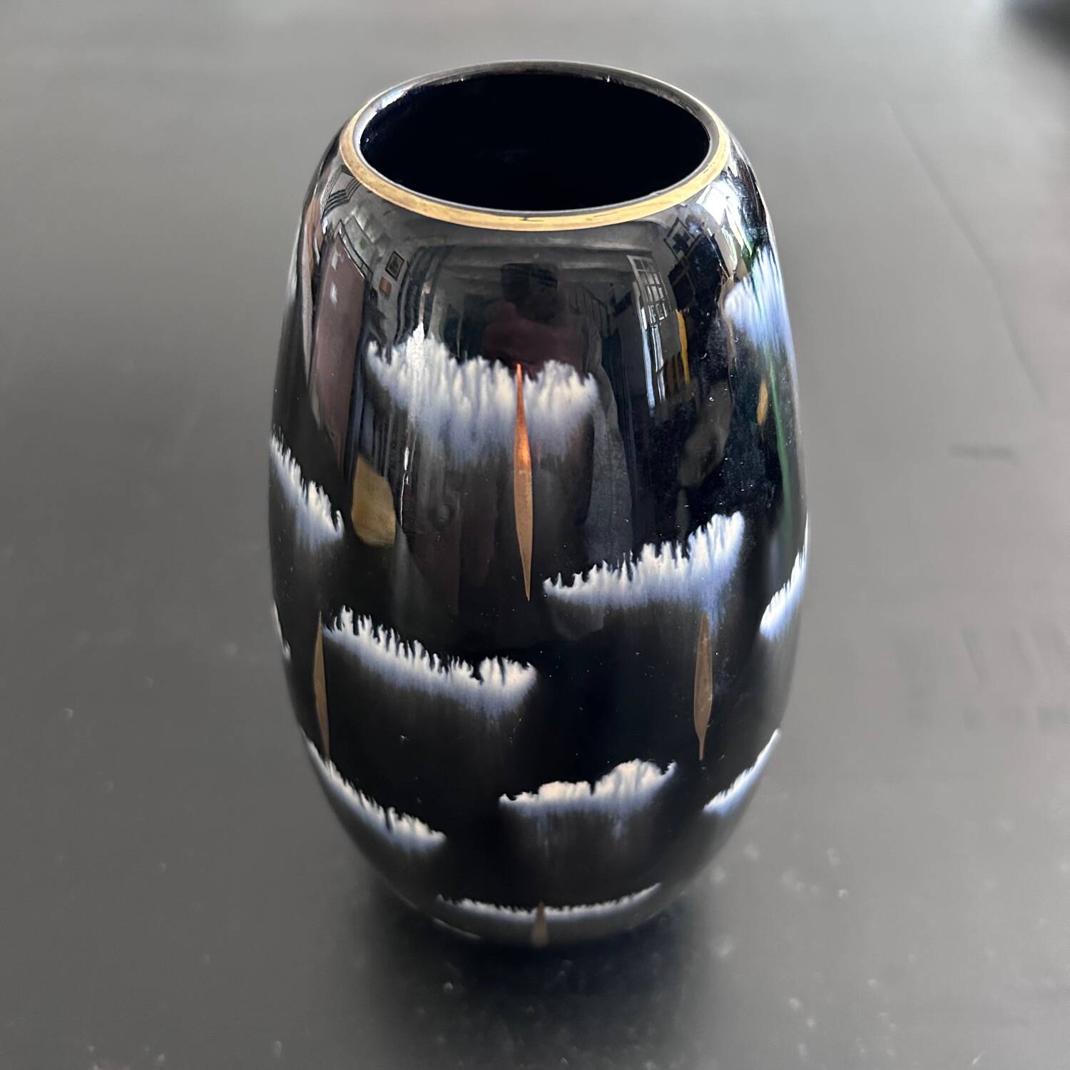 Black, white and gold art deco vase