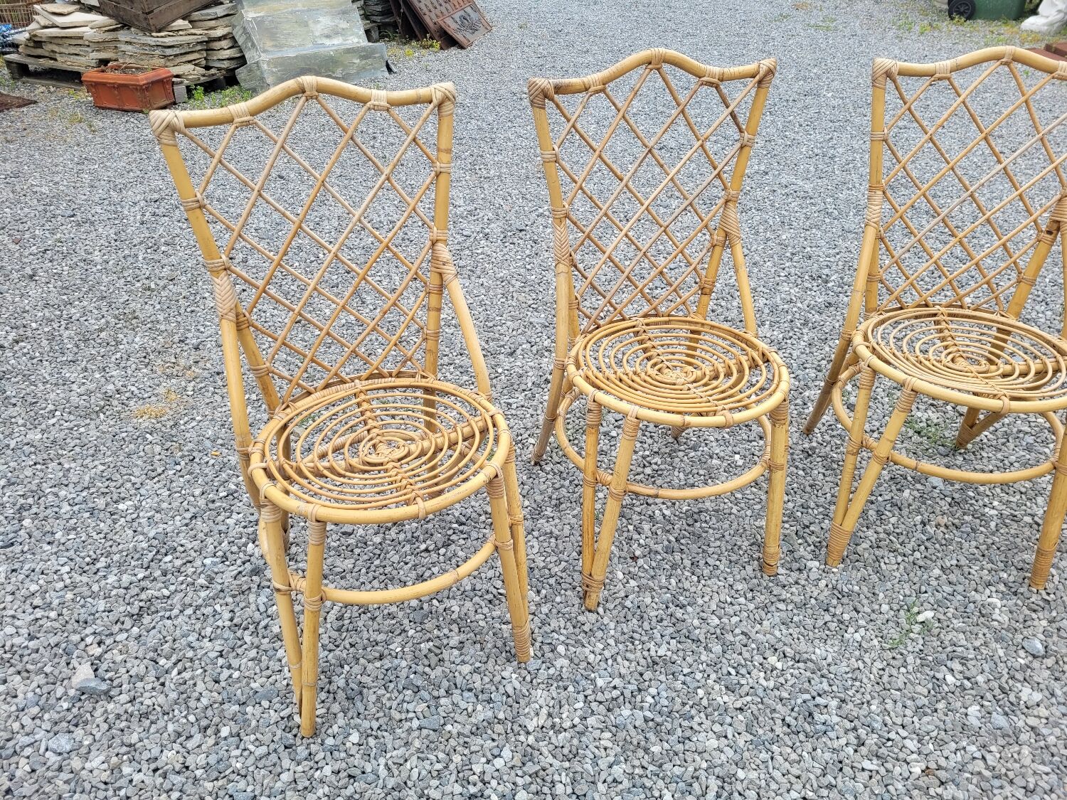 7 vintage rattan chairs