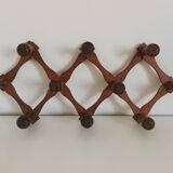 Vintage accordion coat rack