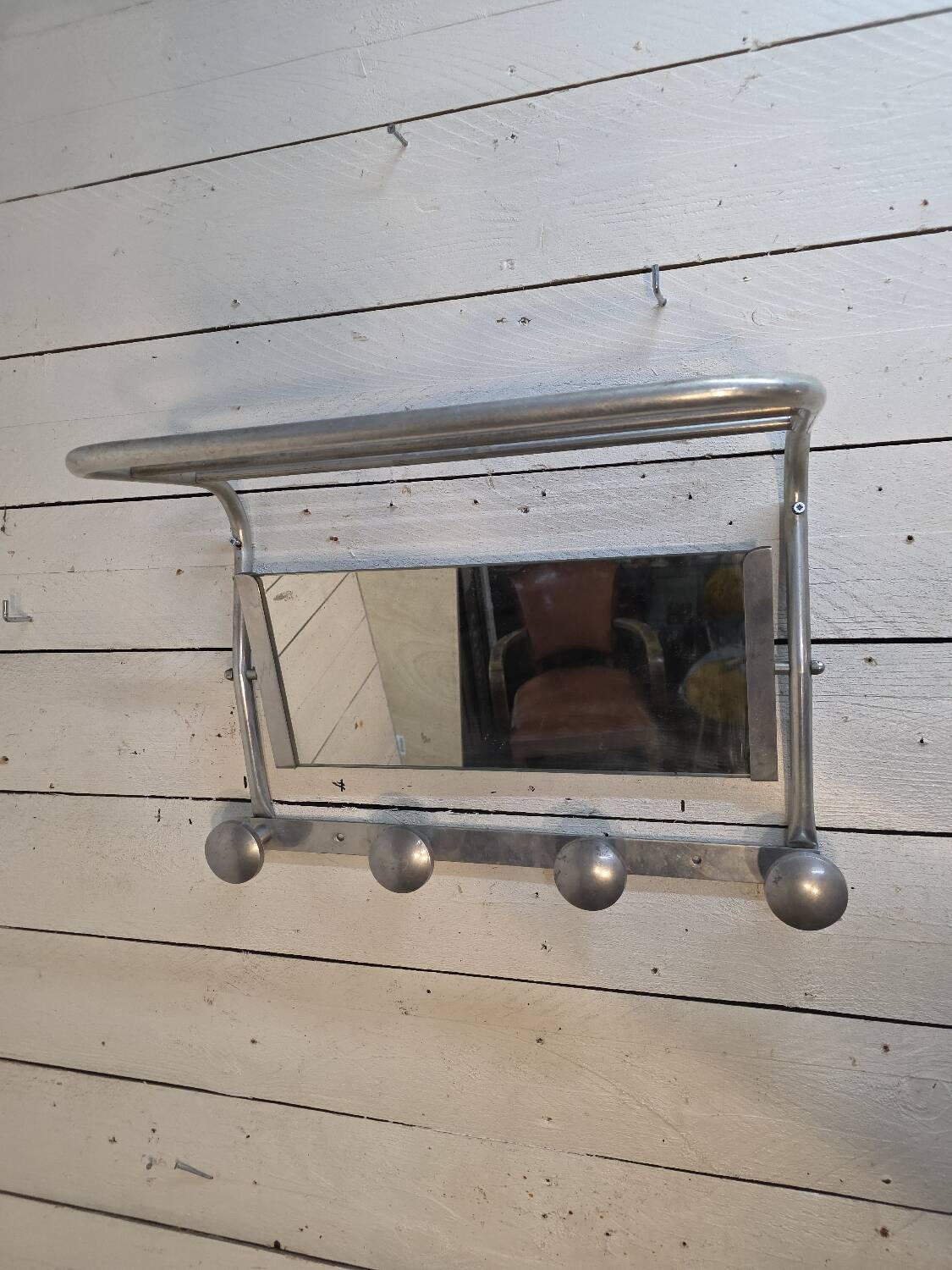 1960s swivel mirrored aluminum coat rack