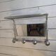 1960s swivel mirrored aluminum coat rack