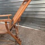 Vintage wooden and cane chaise longue