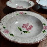 Deep plates series of six Niderviller stoneware, 20th century Cassandre decoration