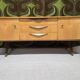 Vintage low enfilade from the 50s/60s – sculptural handles & tapered legs