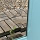 Beveled mirror on turquoise Parisian door