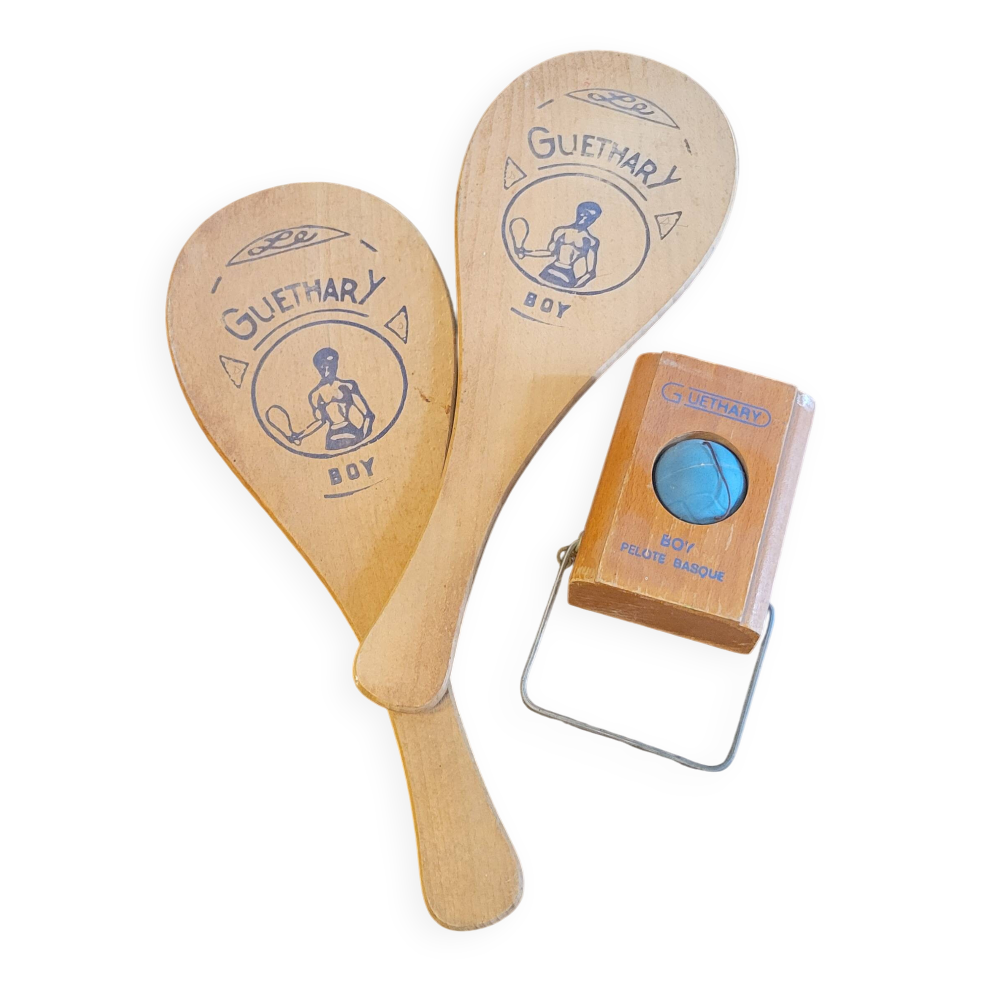 Basque pelota game with 2 rackets and 1 ball from the 50s and 60s, Guéthary boy in wood.