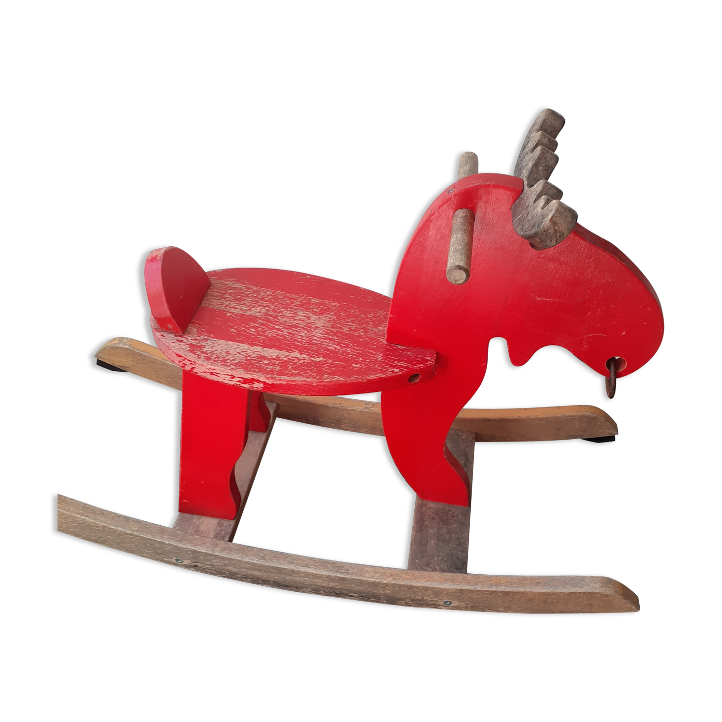 Old reindeer with wooden rocking