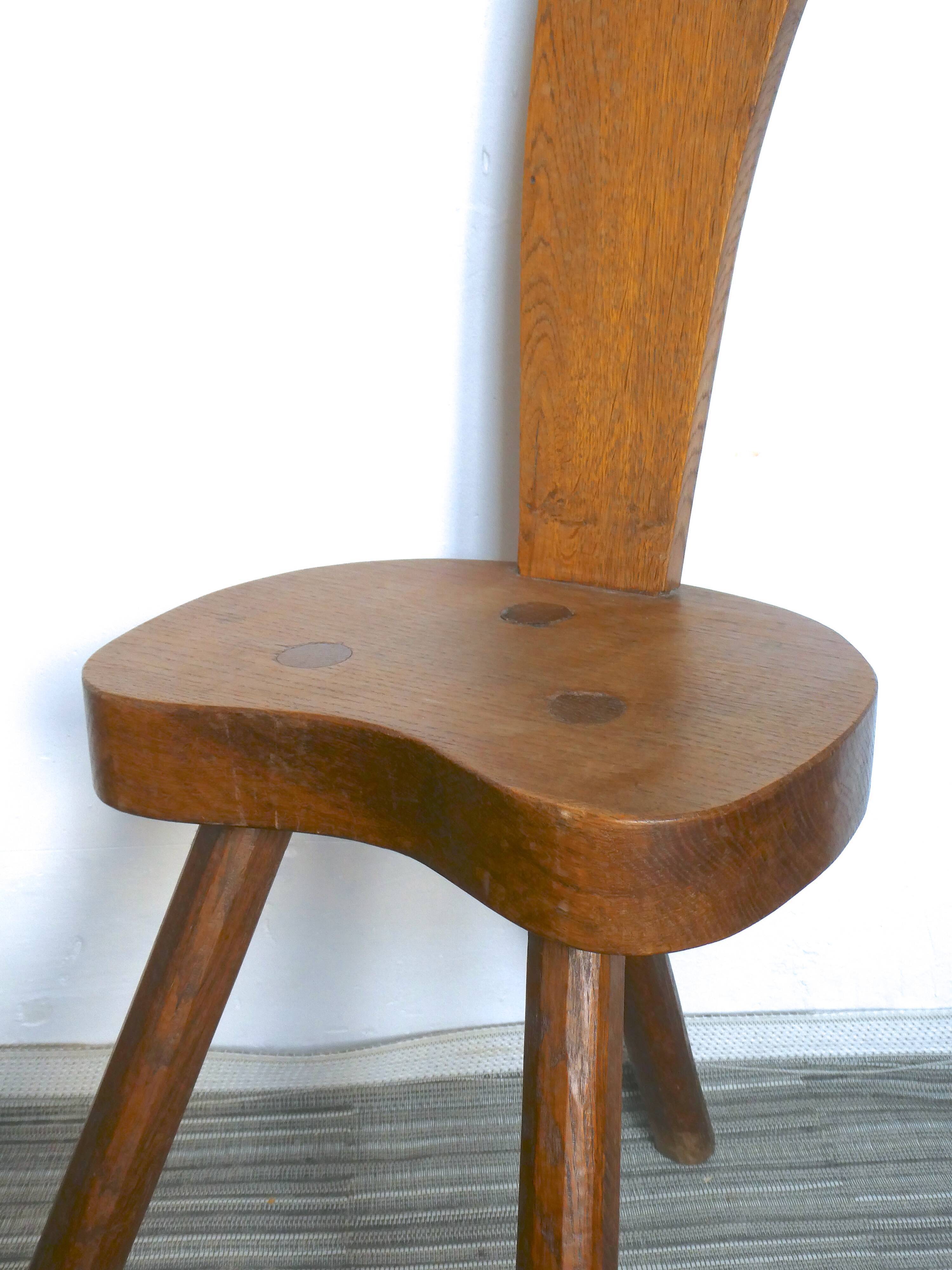 Massive, brutalist wooden tripod Chair