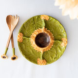 Old dish in sunflower slurry