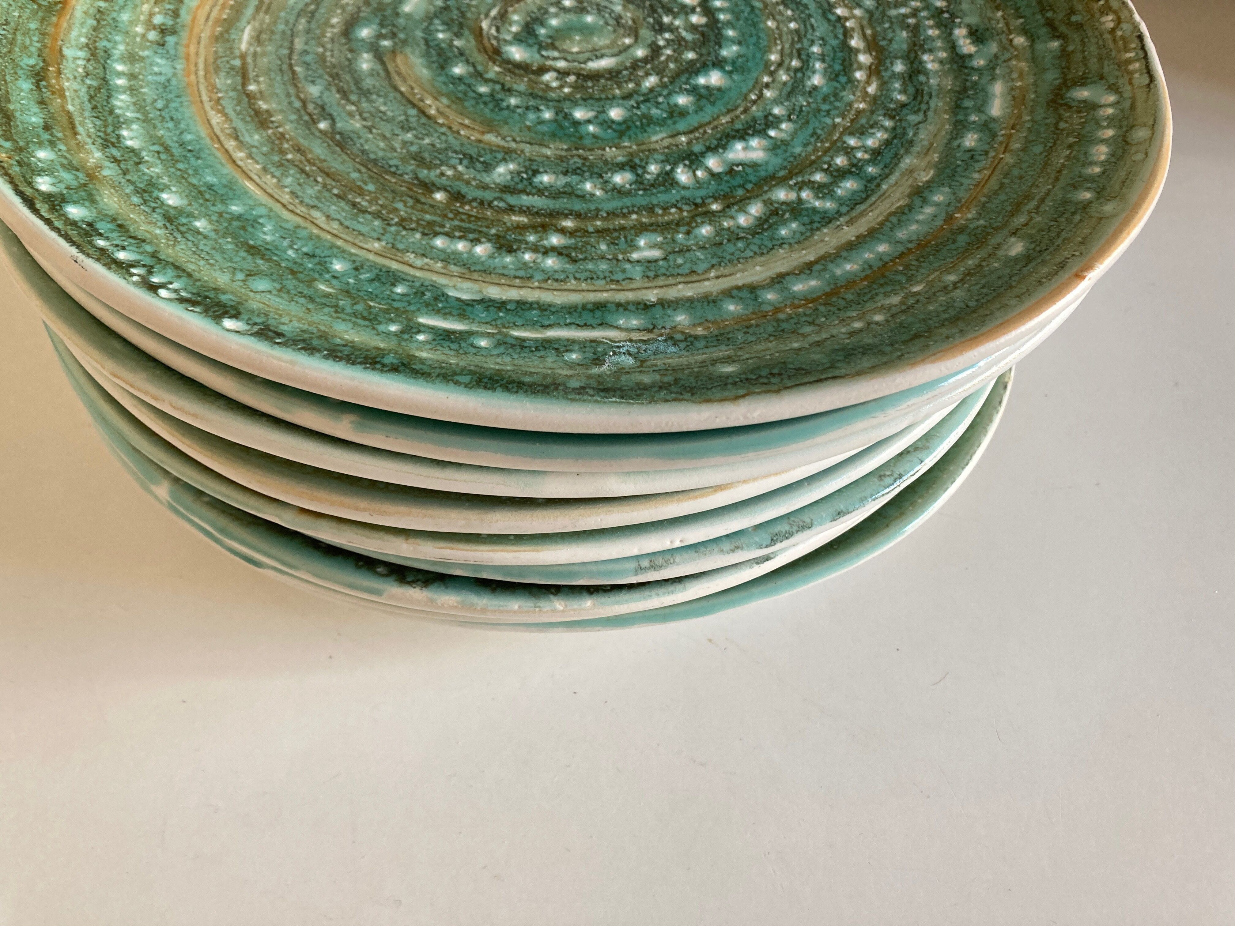 Set of 9 plates 1970 in stoneware Mousse de Nierderviller