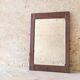 Miroir bois sculpté
