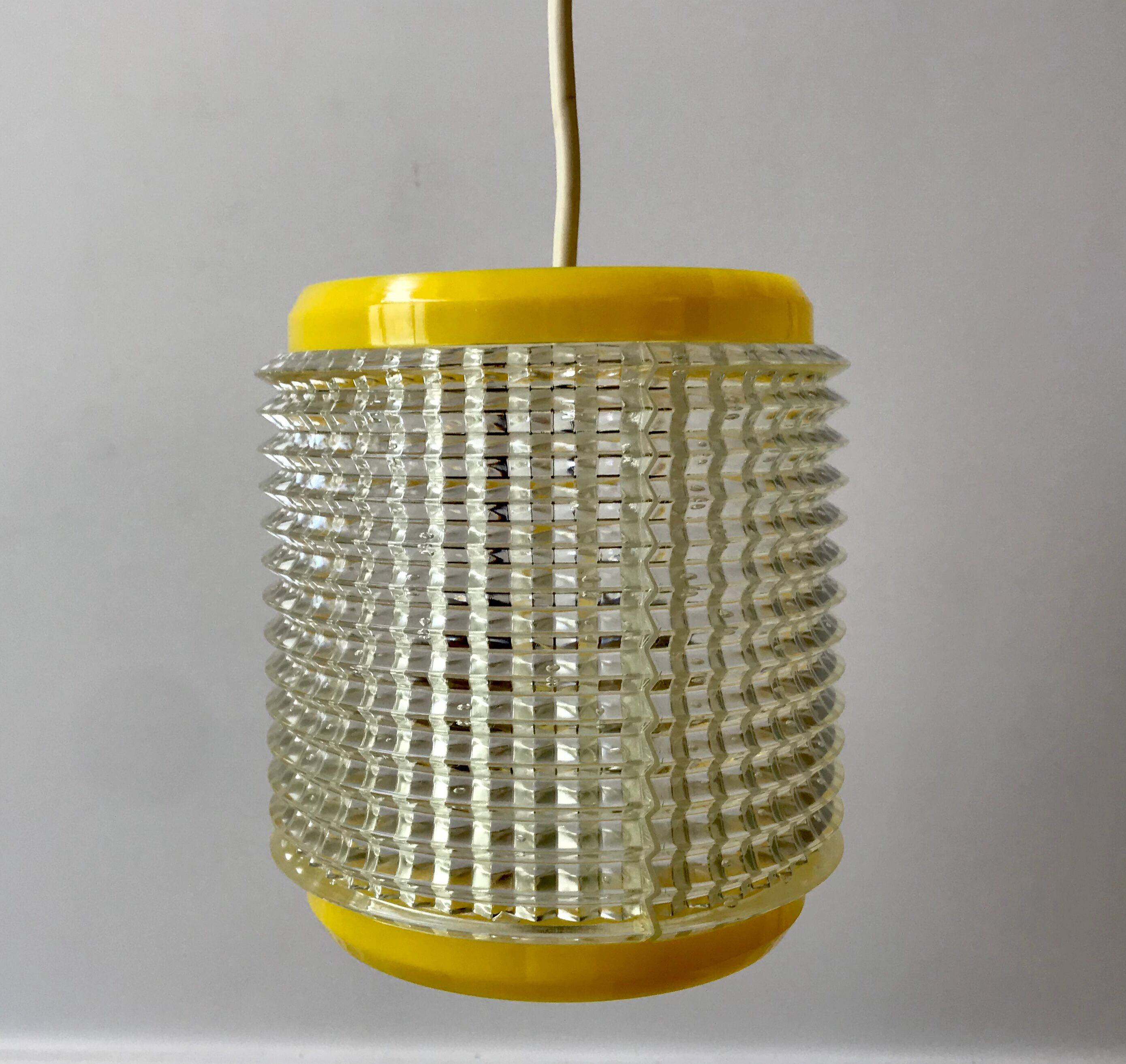 Suspension in yellow plexi and transparent 70s