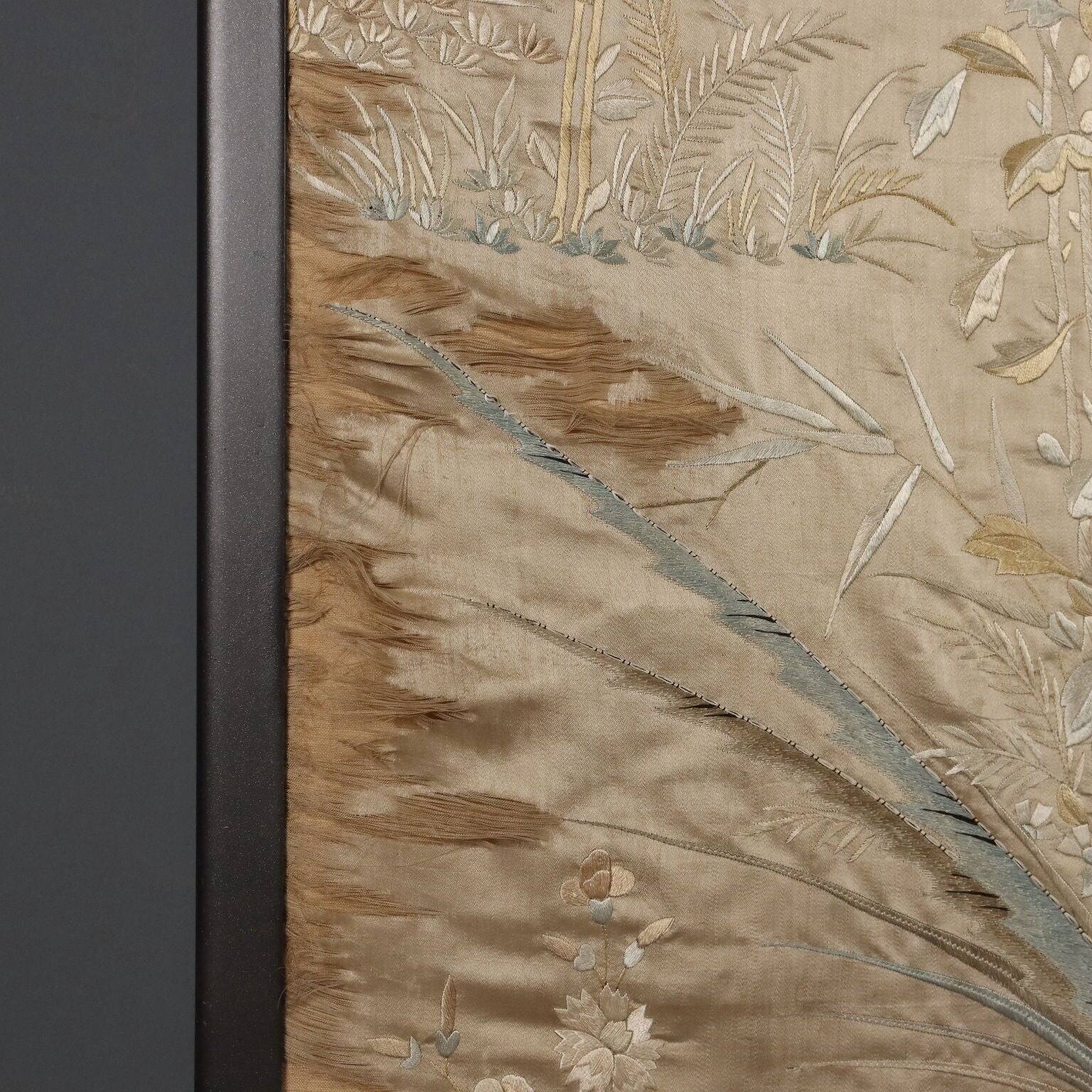 Large antique screen in coloured and embroidered silk, 19th century.