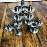 Modular chrome metal candle holders by Nagel & Stoffi. Set of 4