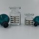 Two vintage 70s glass and metal bottles