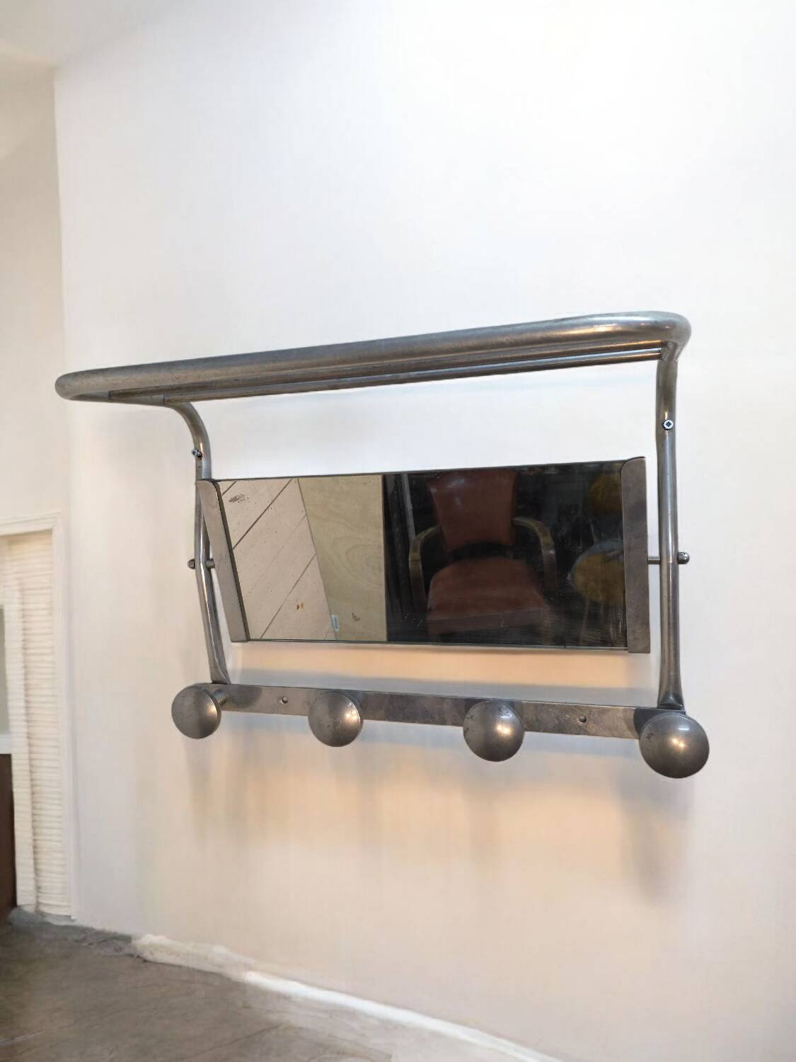 1960s swivel mirrored aluminum coat rack