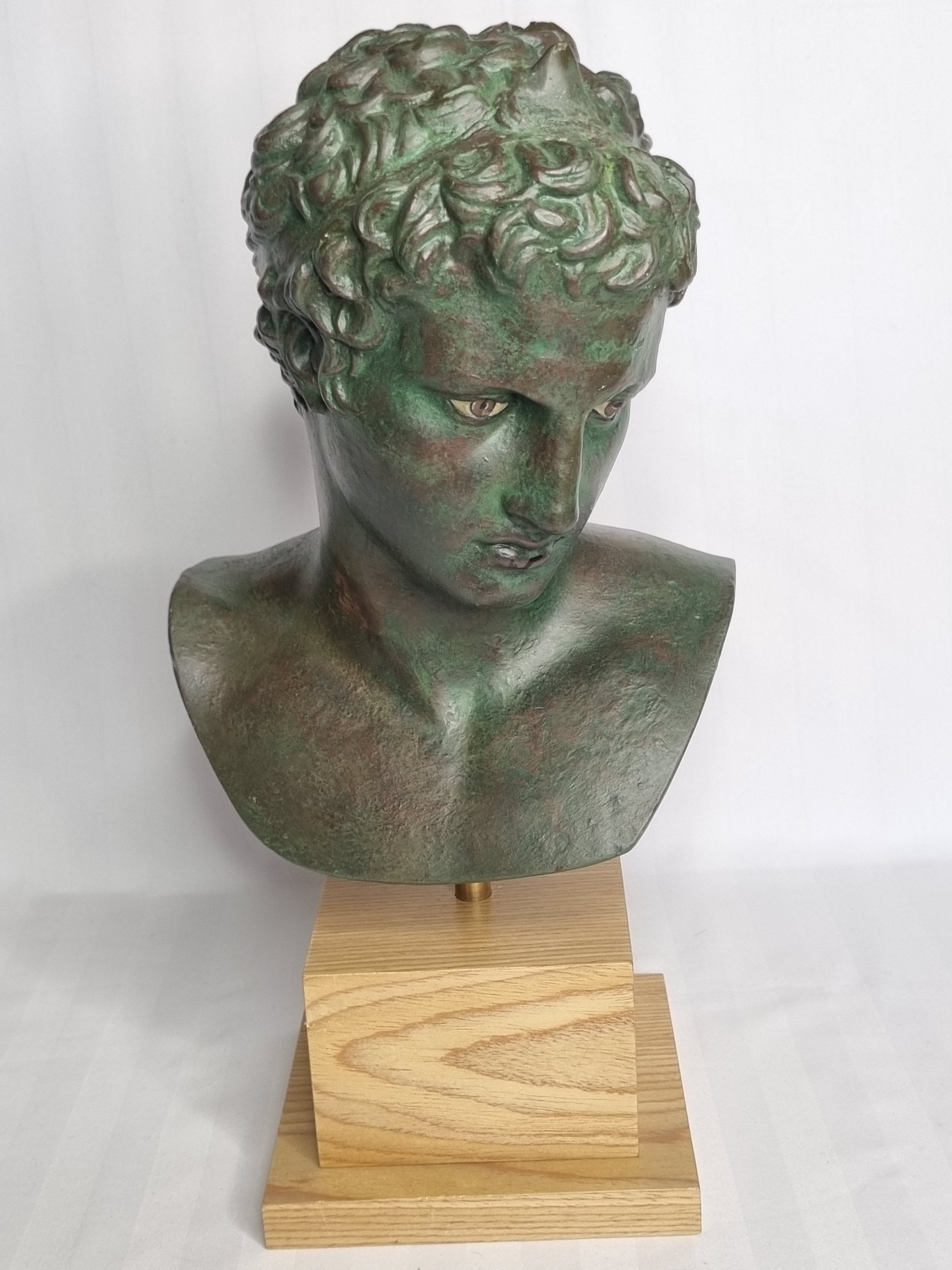 Bust of the Ephebus of Marathon in patinated plaster on base