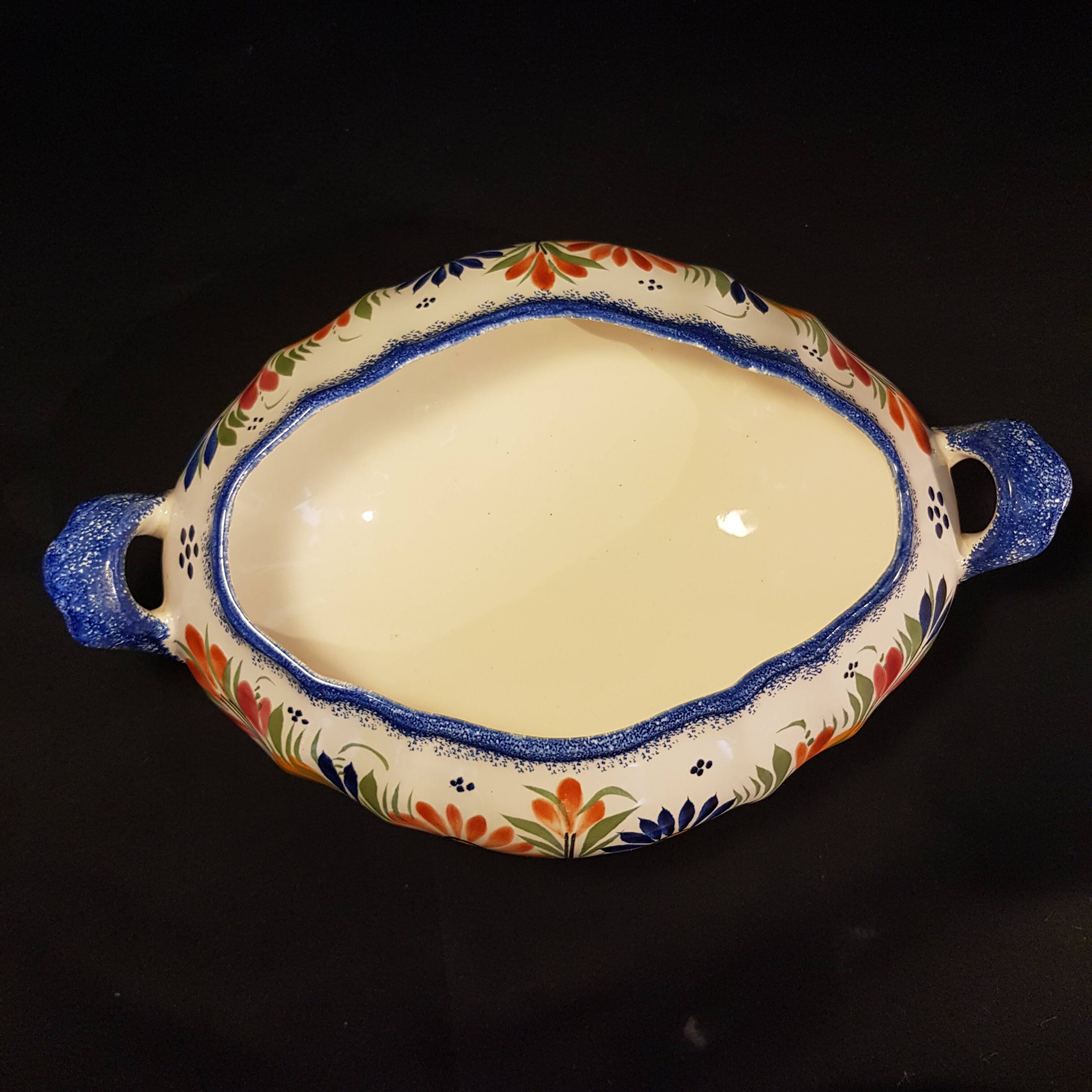 Vegetable soup tureen on Henriot Quimper display dish