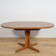 Table à manger ronde extensible en teck des années 1950, Royaume-Uni