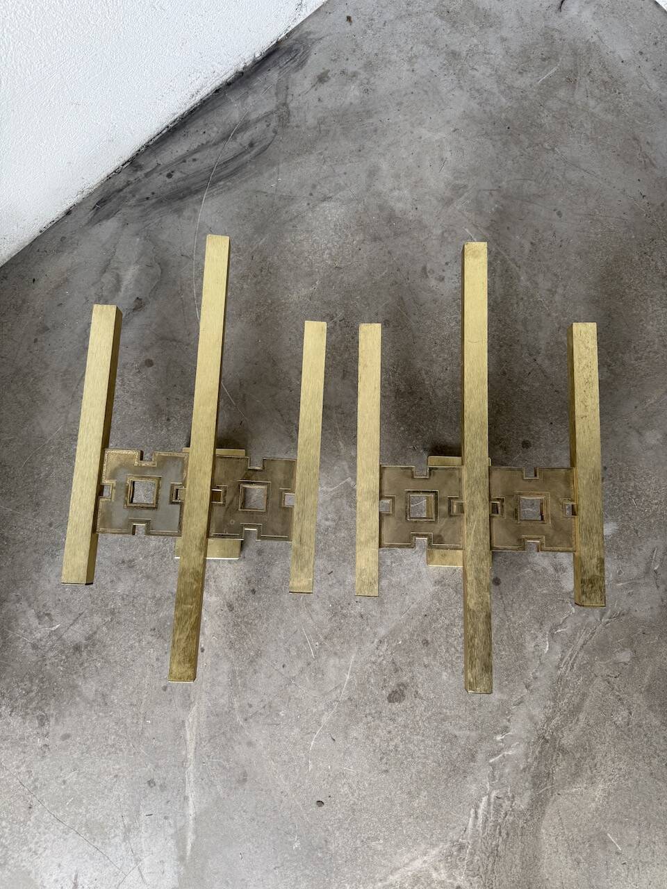 Pair of Regency brass wall lights in Italy