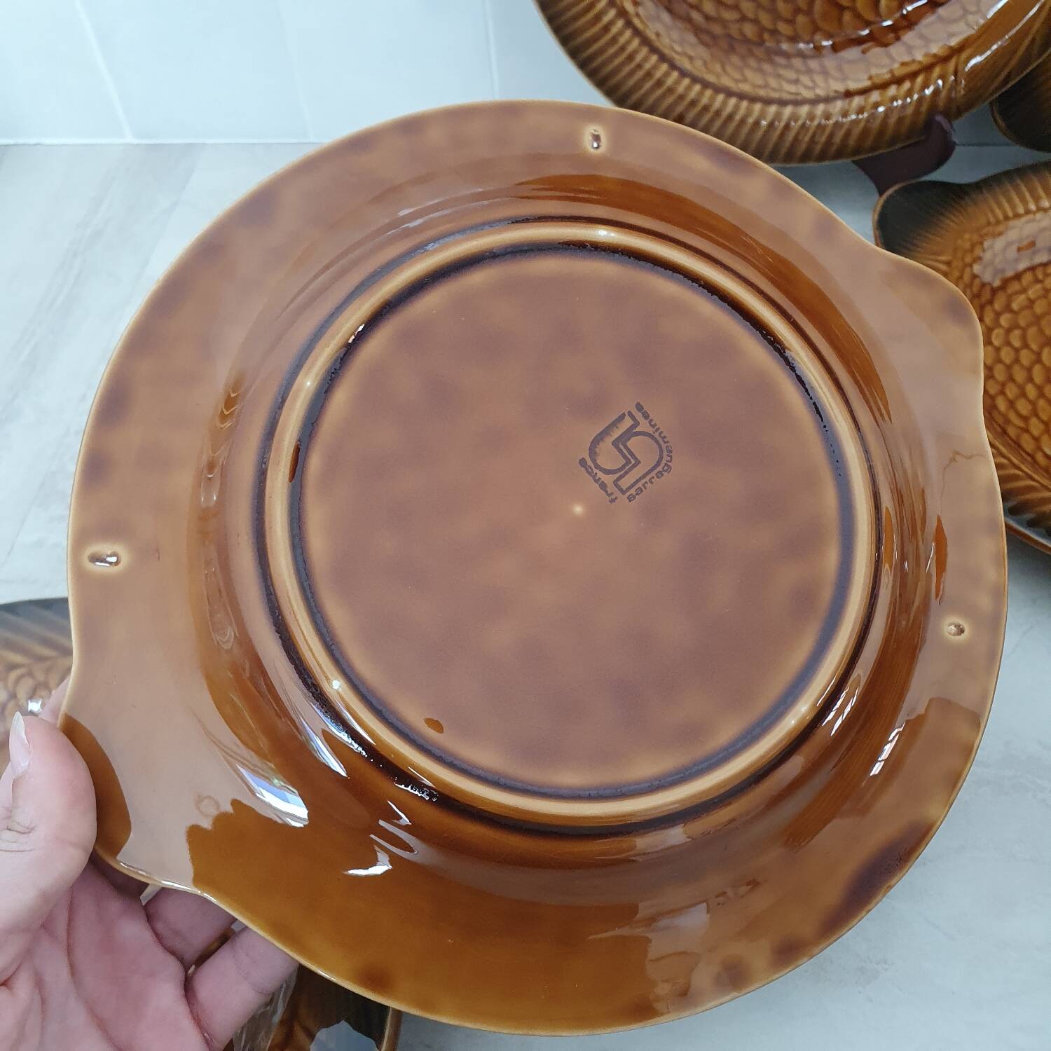 Sarreguemines / 11 earthenware fish-shaped plates