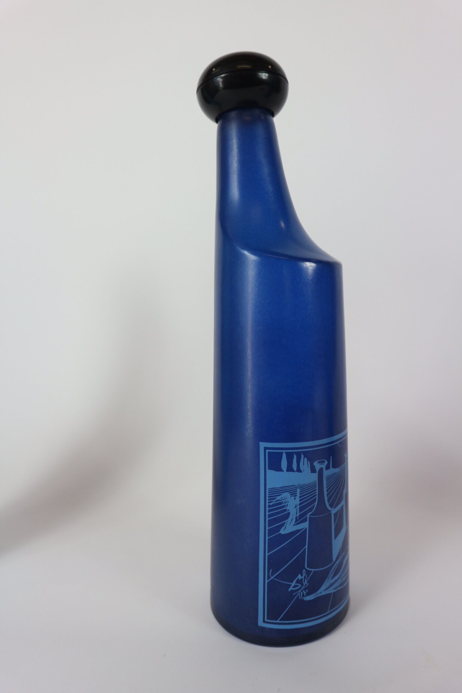 three blue bottles by Salvador Dali for Rosso Antico