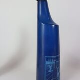 three blue bottles by Salvador Dali for Rosso Antico