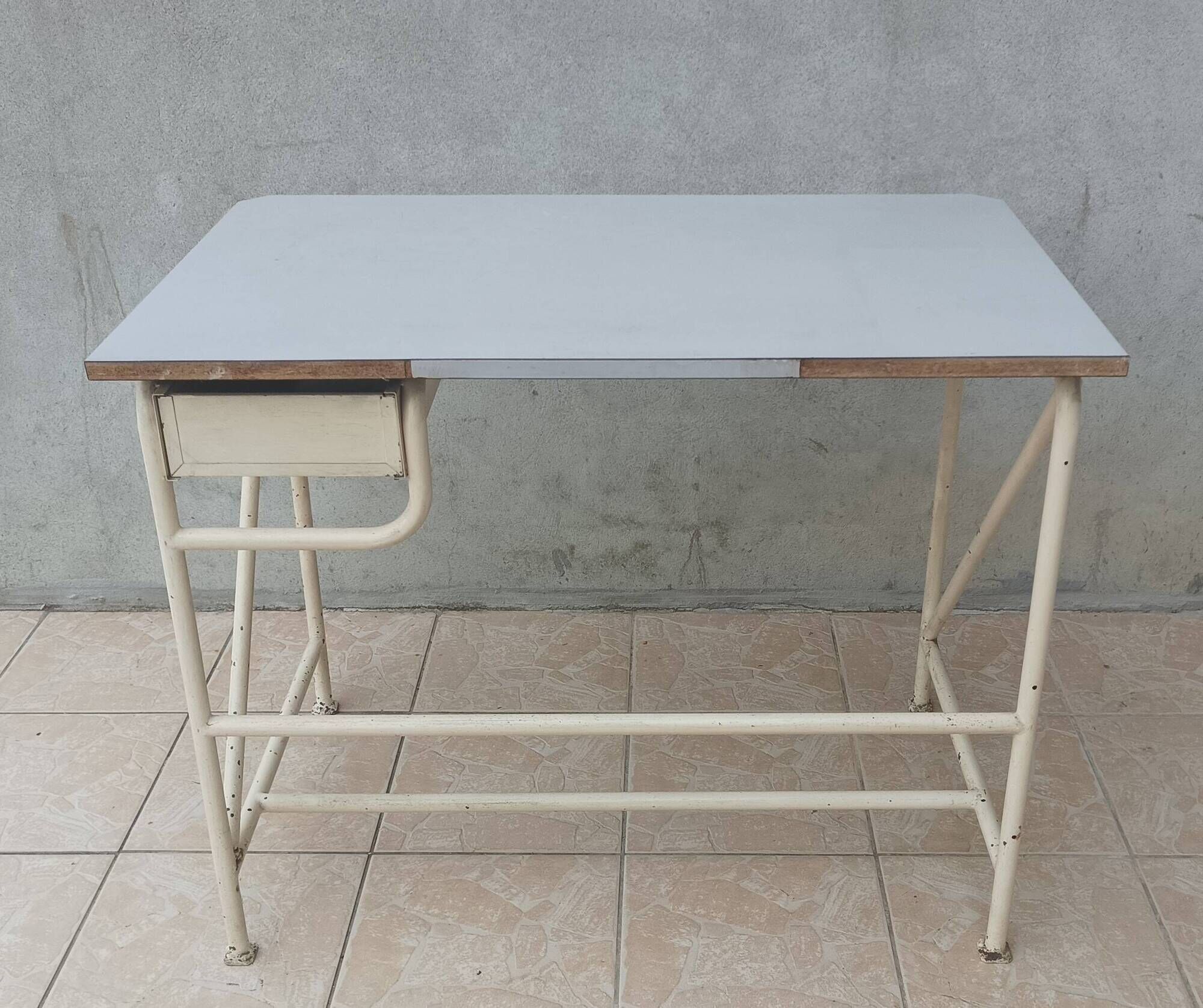 Industrial high table made of metal and formica.