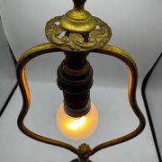 Antique lamp known as a lyre in bronze and marble from the late 19th century.