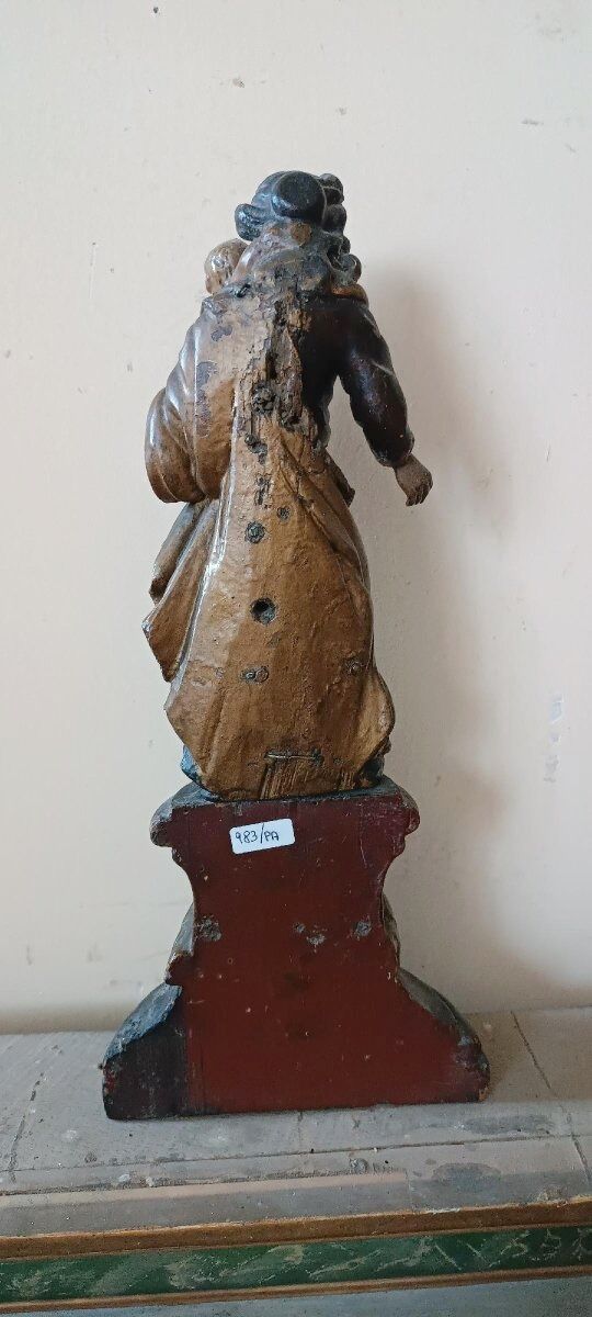 Ancient polychrome wooden sculpture representing the Virgin and Child, from