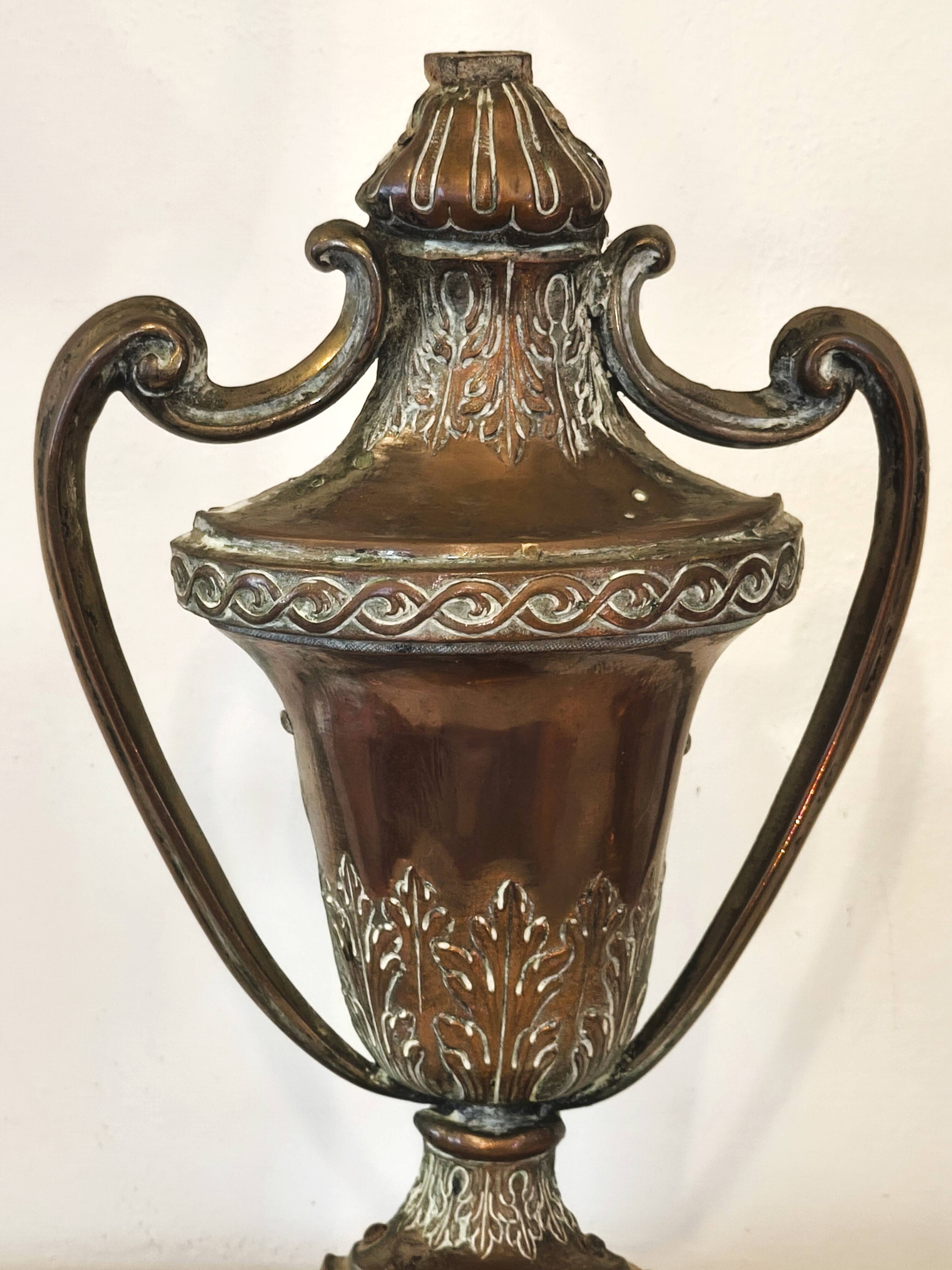 Pair of solid wood and bronze door handles, classical style, Italy 20th century.