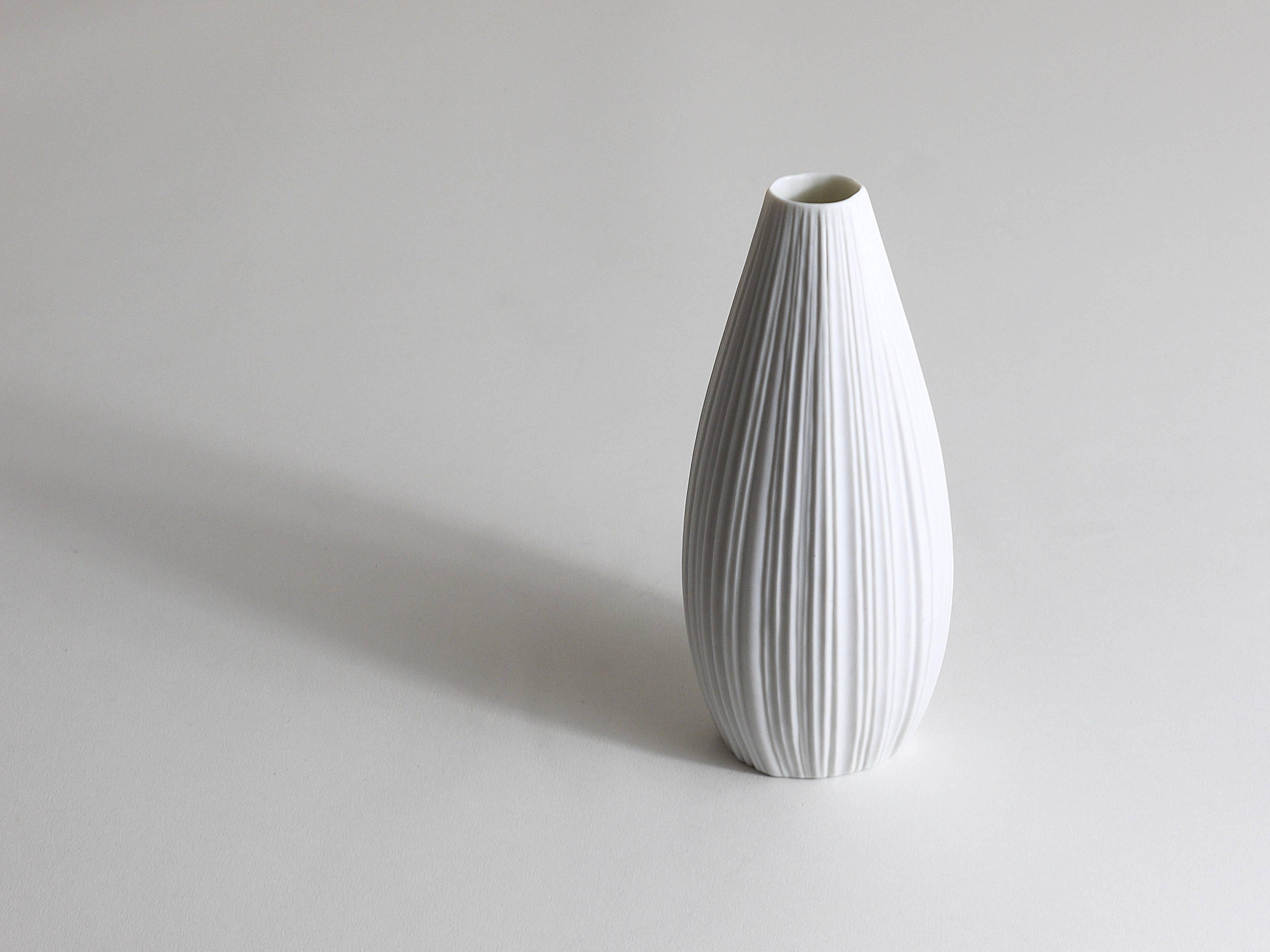 White porcelain vase with striped relief by Rosenthal, designed by Martin Freyer, Germany, 1960s.