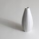 White porcelain vase with striped relief by Rosenthal, designed by Martin Freyer, Germany, 1960s.