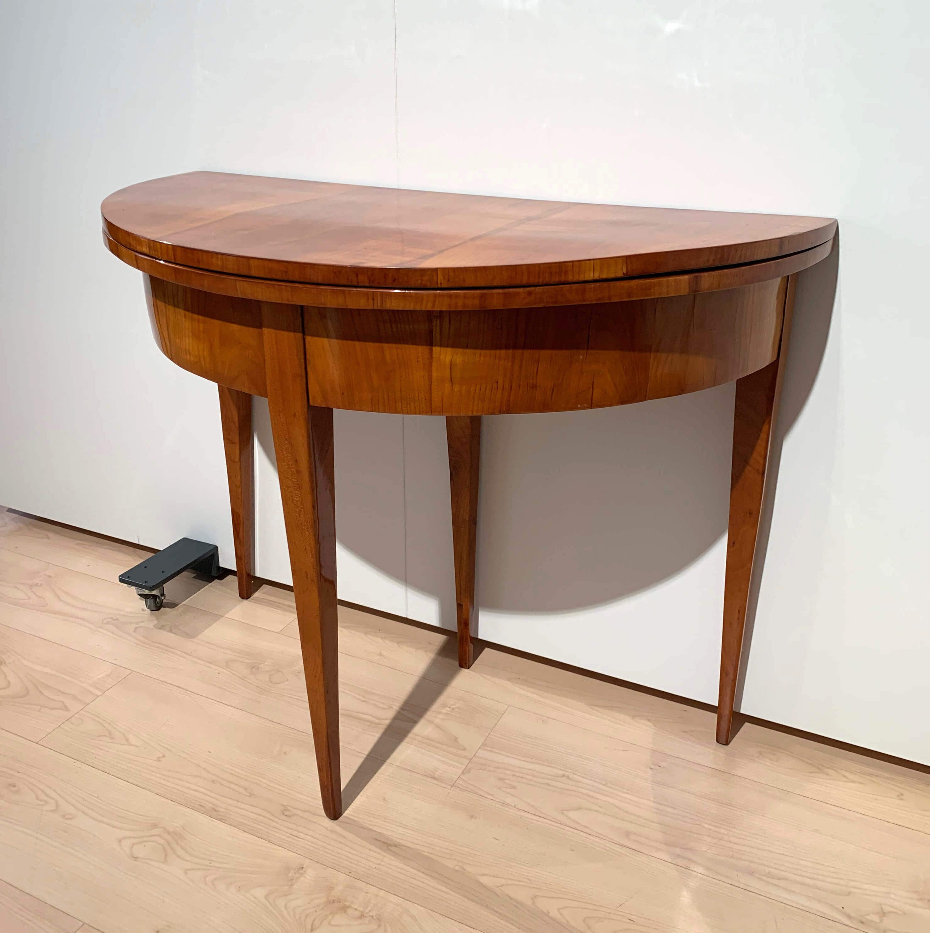 Biedermeier demi-lune fold-out table, cherry veneer, south germany, circa 1820