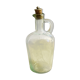 Green pitcher made of vintage glass