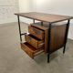 Bureau en palissandre à caisson suspendu